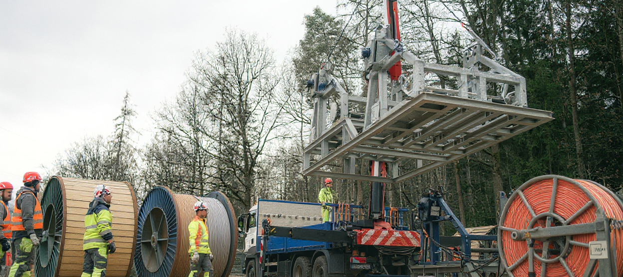 Cteam crew working on cable installation for infrastructure projects.
