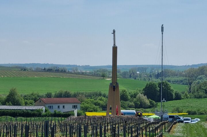 Cteam professionals perform construction and installation work on a tall tower structure. Cteam professionals perform construction and installation work on a tall tower structure.